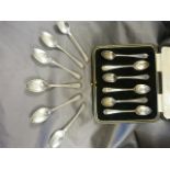 A boxed set of six spoons Sheffield by Cooper Brothers & Sons Ltd and a set of six silver engraved