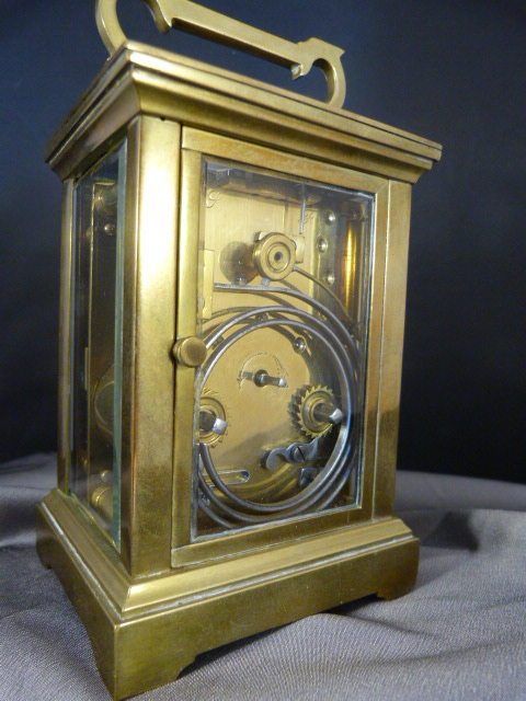 French brass carriage clock with white enamelled dial and Roman Numerals, Chiming action works on - Image 7 of 14