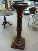 19th Century heavy mahogany plant stand of Baluster form - in need of slight restoration to column.