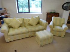 Large two seater green and cream upholstered settee with matching pouffe and armchair
