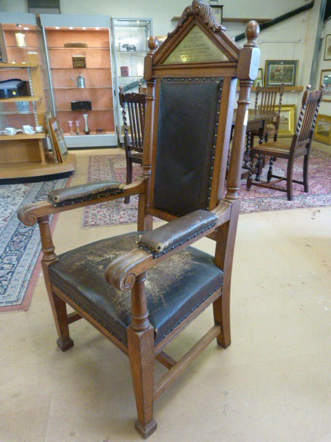 Heavy carved Oak framed Lodge chair with leather arms and seat padded with horse hair. Brass - Image 5 of 6