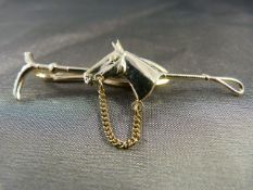 Equestrian - Hunting tie clip in the form of horses head mounted on a hunting whip - in unmarked