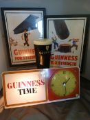 Guiness Time light up clock - free standing along with two pictures and a Guiness promotional cup