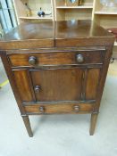 An early mahogany drinks cabinet/washstand with lift top, the fold out top forms two trays either