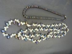 Two freshwater pearl necklaces with rhinestone and silver clasp and another double string black