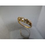 5 Stone diamond ring set in 18ct Gold. Weight 2.3g, size M1/2