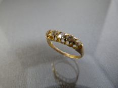 5 Stone diamond ring set in 18ct Gold. Weight 2.3g, size M1/2