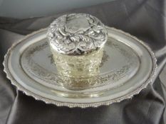 Silver topped trinket pot and a small dressing table tray(plate)
