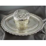 Silver topped trinket pot and a small dressing table tray(plate)