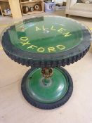 Allen wheel table with glass top