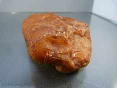 A Large piece of Raw Amber - Total Weight 97.6g approx 8cm x 8cm x 4cm