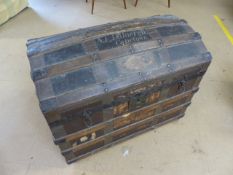 Large dome topped metal bound trunk