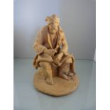 Unglazed Terracotta figure folk art of a Working man. Caltagirone written into base