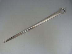 George III Silver meat skewer with ring handle and bearing a Griffin crest with initials below "S