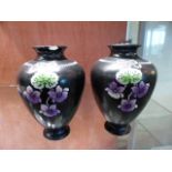 Pair of small Shelley vases decorated with flowers on a black background approx 11 cm high