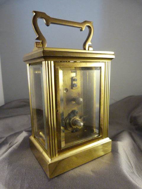 Brass cased carriage clock with five bevelled glass panels made by Fema, London 11 Jewels. White - Image 2 of 2