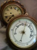 Oak 'rope detailed' Enamel faced clock with key and a similar barometer with coloured dial.