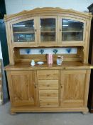 Large pine dresser with cupboards and drawers