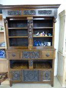 A Good example of an oak Gothic Revival Dresser. The unusual dresser starts with three lozenge