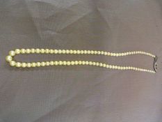 17.5" Graduated Cultured pearl necklace. The slightly cream coloured pearls range from approx 3mm to