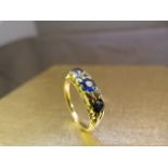 18ct Yellow Gold antique ring set with three large Ceylon sapphires and four diamond chips.