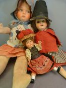 Late 19th/Early 20th Century Strobel & Wilken Co. German Doll. Dressed with paper top hat and Red