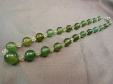 Early Green glass beaded necklace and Rock crystal necklace on possible silver chain