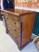 Mahogany Scottish chest of drawers with barley twist pillars to sides