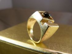 Gent's Contemporary 1970's design ring. Unmarked Gold (possibly 14K), set with an approx 10 point