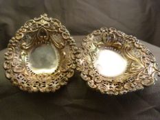 Pair of Birmingham hallmarked silver bon bon dishes with pierced and repousse decoration Total