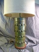 Large metallic bronze finished temple style oriental lamp with large shade.