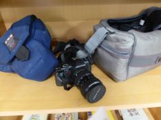 Pentax P-30 camera in fitted case along with flash and other pieces and a travel bag/protector