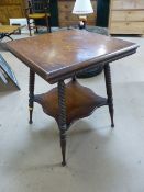 Two tier carved occasional table with Barley Twist legs.