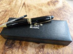 A Boxed Mont Blanc Meisterstuck Biro pen with White star end. Yellow and Black metal mounted pen