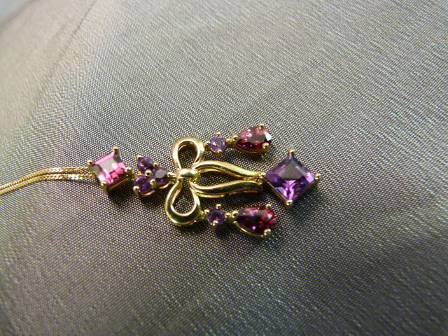 9ct gold Chandelier style pendant set with Red and Purple stones (possibly Amethyst and Rubies), and