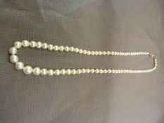 17" Graduated Cultured Pearl necklace, The Slightly baroque pearls range from 3mm to 7.25mm centre