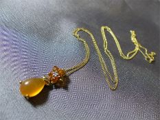 9ct Gold five Fire Opal and small Diamond Flower head pendant, with a Cabachon tear drop shaped Fire