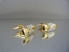 Pair of 18ct gold diamond encrusted cufflinks Hallmarked 18ct and set with 14 clear and clean cut