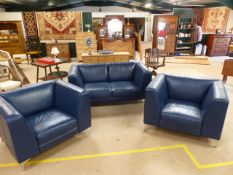 Blue leather three piece suite in the Mid Century style with chrome legs. Suite consists of two