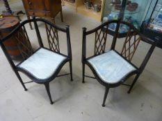 Matching pair of Enbonised corner chairs with inlaid splats in a pierced diamond decoration pattern.