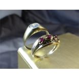 Two 9ct Gold Rings. One set with three small rubies, the other set with a CZ (AF) Size approx UK - N