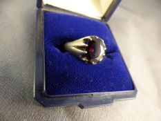 Unmarked yellow gold Gents Garnet ring ( approx 9.3mm x 8mm across) UK - size P1/2 USA - 7.75 Weight