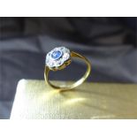 A Victorian 18ct Gold Sapphire and Diamond Daisy Cluster Ring. The 'Daisy' head measures approx