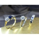 3 Size UK - 'M' and USA - '6' Dress Rings. (1) 14K Sapphire and CZ 3 stone Ring. (2) 14K Sapphire