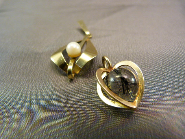 Two 14k Gold Pendants - 1 heart shaped cage with an approx 11mm Tourmilated Quartz Ball inside,