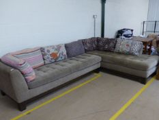 RocheBubois corner sofa with patterned cushions and mushroom grey seats