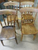 Set of four farmhouse style oak chairs