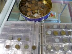 Tin containing various coins to include some silver