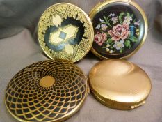 Four ladies powder compacts - to include Elizabeth Arden etc