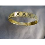 Hallmarked Silver Gilt bangle c1970 - Safety chain needs repair. Star decoration